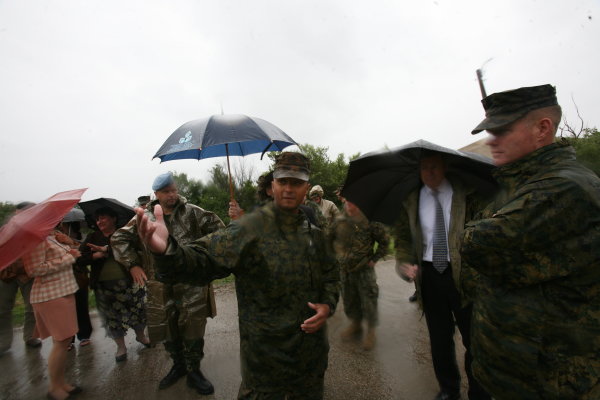 Corps to Marines: Would a small black umbrella make you happy?