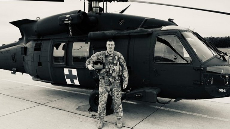 When a stranger was hit by a car this Army medic ran to his aid and never left his side