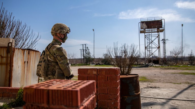 US service member suspected in attack on ammo dump at American base in Syria