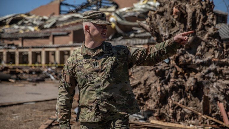 National Guard troops mobilized to help in rescue efforts after tornadoes hit Arkansas
