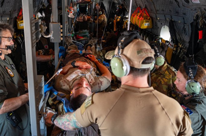 Papua New Guinea Defence Force, Royal Australian Air Force, and U.S. Air Force medical personnel practice rendering first aid to “patients” and medical training mannequins on a RAAF C-27J Spartan mid-flight during Pacific Angel 24-1 at Papua New Guinea, Aug. 29, 2024. Pacific Angel 24-1 focuses on exchanging and teaching tactics and techniques between the participating countries. Papua New Guinea Defence Force medical personnel will learn standards to integrate into their own standard operating procedures. (U.S. Air Force photo by Airman 1st Class Carson Jeney)