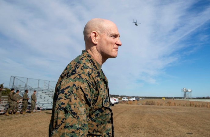 U.S. Marine Corps Sgt. Maj. Troy E. Black, the 19th Sergeant Major of the Marine Corps, observes a forward area refueling point demonstration at Marine Corps Air Station Cherry Point, North Carolina, Jan. 13, 2022. The demonstration was part of a three-day Sergeant Major of the Marine Corps Force Level Summit. The summits are held quarterly to support force level sergeants major at their respective commands. (U.S. Marine Corps photo by Sgt. Victoria Ross)