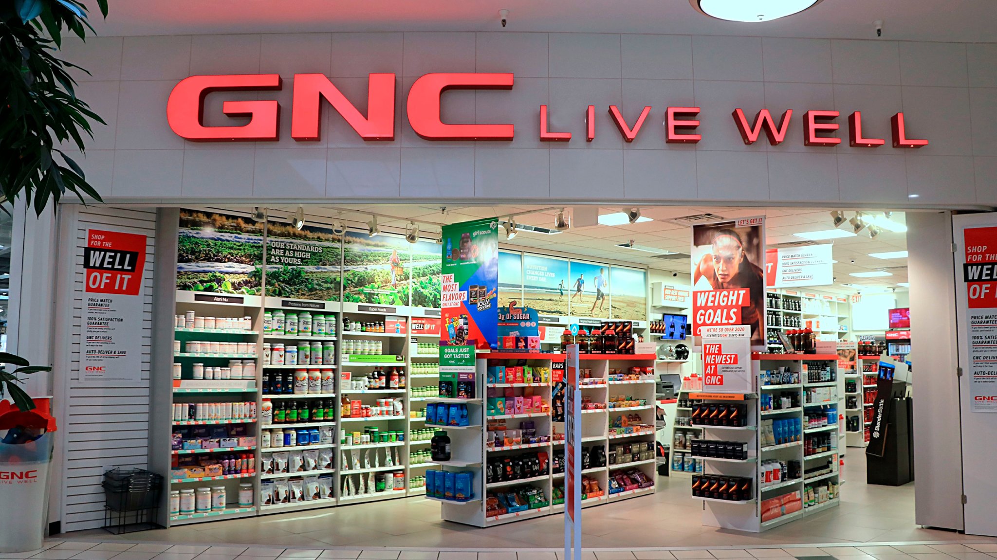 GNC Live Well store entrance within indoor mall showing products on shelves, Idaho. (Photo by: Don and Melinda Crawford/UCG/Universal Images Group via Getty Images)