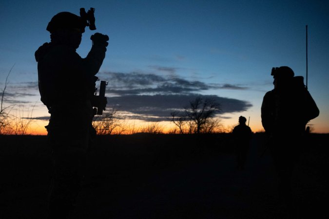 Defenders from the 22nd Security Forces Squadron prepare for night operations during Lethal Defender Dec. 2, 2023, at Smoky Hill Air National Guard Range, Kansas. Lethal Defender is a weeklong training exercise designed to train defenders on all elements of the efficient setup and maintenance of expeditionary air bases. (U.S. Air Force photo by Airman 1st Class William Lunn)