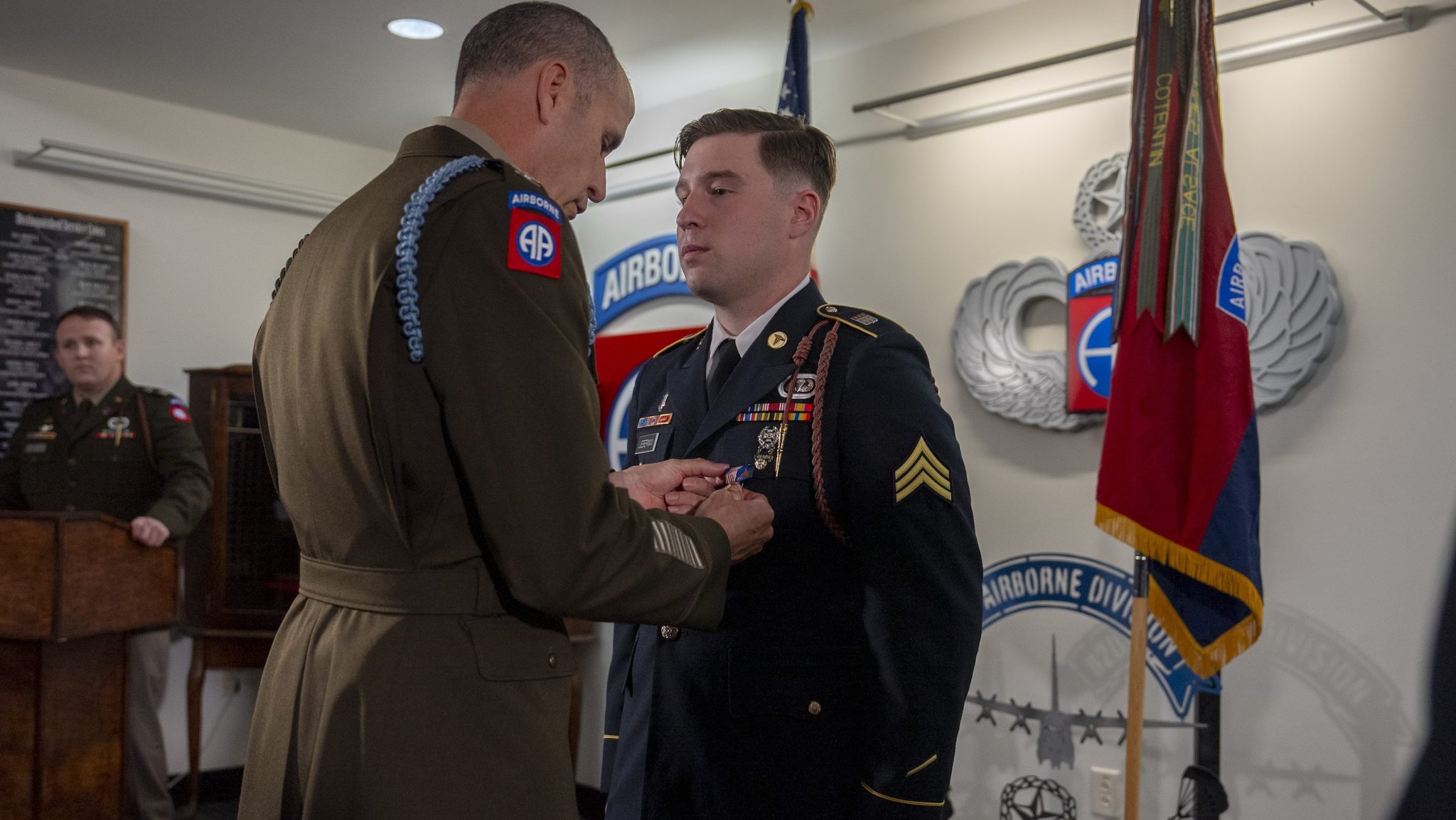 Sgt. Brian Lieberman, a Paratrooper assigned to 1st Brigade Combat Team, 82nd Airborne Division, receives the Soldier's Medal from Col. Jason Schuerger, commander of 1st Brigade Combat Team, during a ceremony at Fort Bragg, North Carolina, May 6, 2025. Sgt. Lieberman was awarded the medal for taking decisive action to save a life during an active shooter incident at his apartment complex. The Soldier's Medal recognizes individual acts of heroism on behalf of fellow Soldiers or civilians. (U.S. Army photo by Spc. Prim Hibbard)